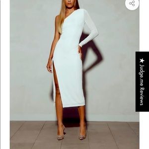 Brand new, never worn, tags still on dress. Size US 4. Ivory dress - Kianna